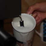 Foaming milk with the Mr. Coffee Steam Espresso Maker