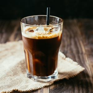 An Iced Americano is an Americano coffee made with cold water and served over ice. 